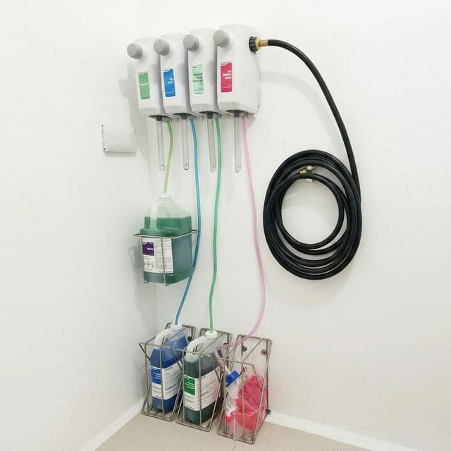 Professional-grade Ecolab cleaning solution dispensers